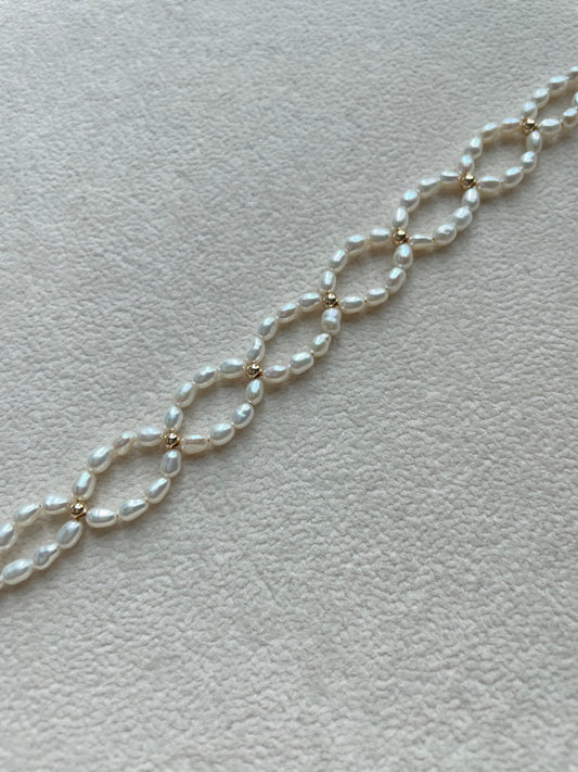 Vòng tay ngọc trai hạt gạo 3m đan dây