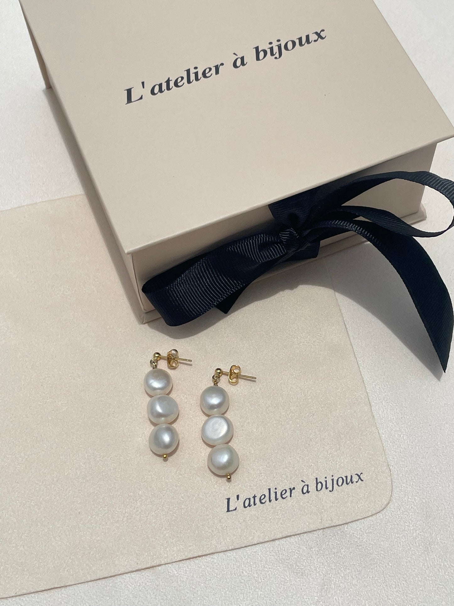 Audrey triple pearl earrings